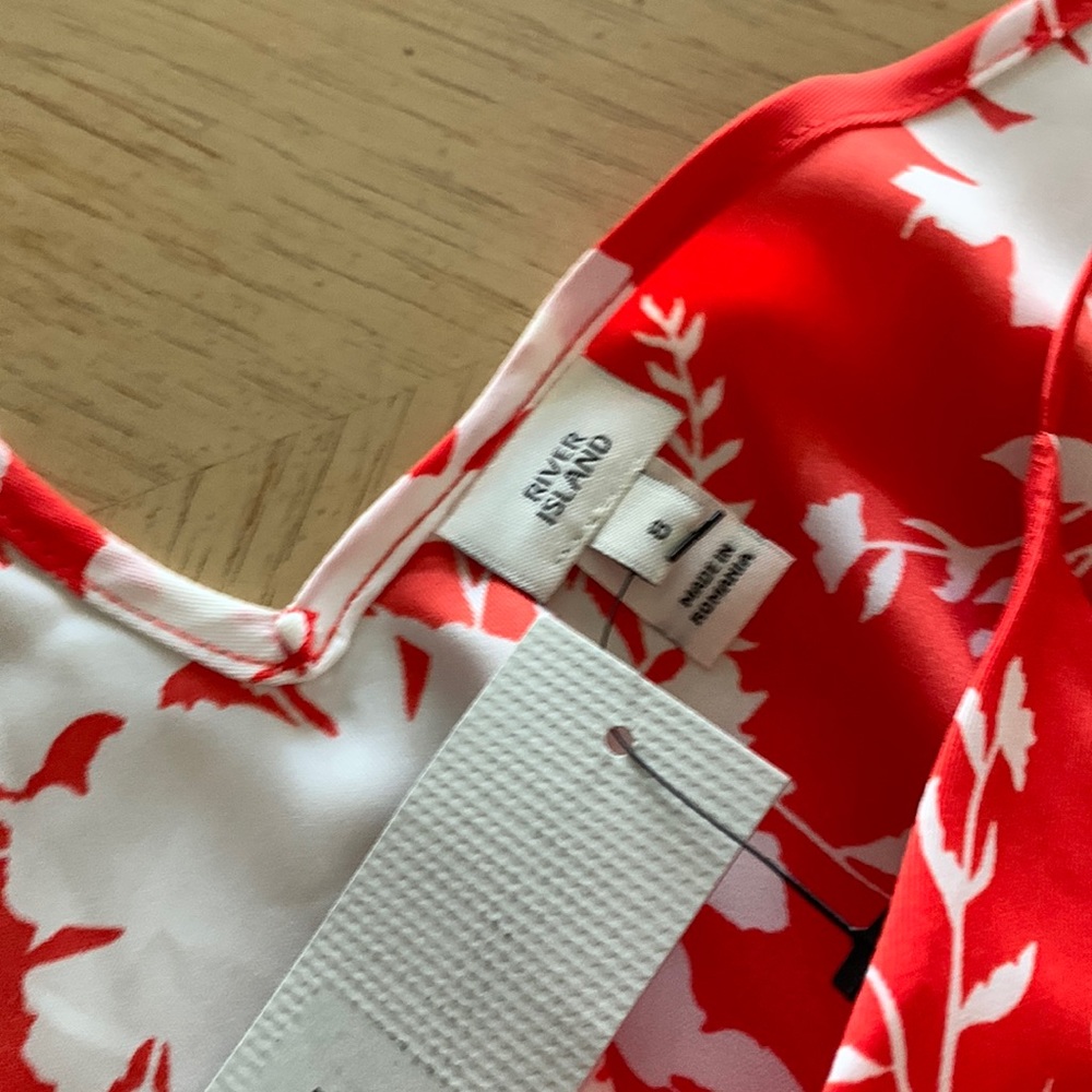 Red and white silky camisole